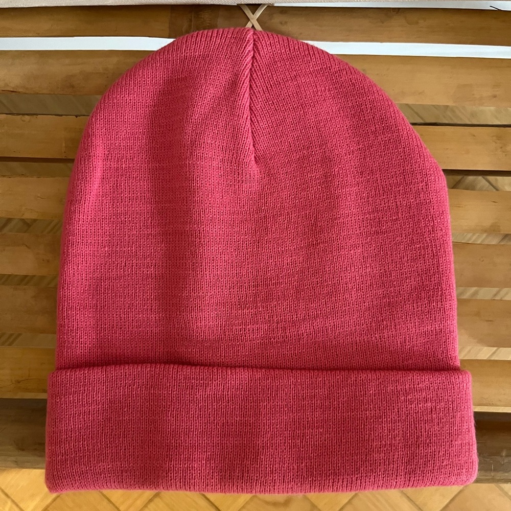 Bright pink beanie from ASOS.